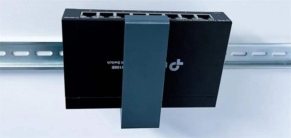 TP-LINK držák na DIN lištu pro rozmer 101x25mm šedá antracit SG108xx/SF1006P/ER605/RP108GE
